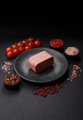 Food, meat, ham sliced in slices for the festive table. Spiced ham