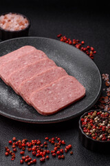 Food, meat, ham sliced in slices for the festive table. Spiced ham