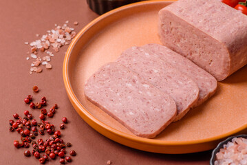 Food, meat, ham sliced in slices for the festive table. Spiced ham