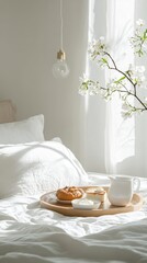 Breakfast Tray on Bed with White Flowers