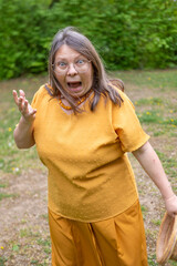 Angry mature woman arguing, blaming, frustrated aggressive yelling, accusation emotion, emotional...