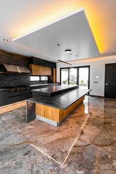 Modern luxurious kitchen with sleek marble and wood design