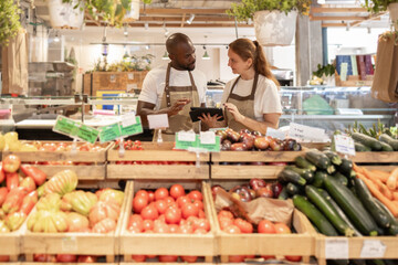 Eco-conscious staff discussing store operations