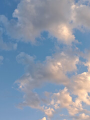 Golden Touches on Evening Clouds in Blue Sky