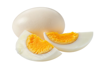 Sliced boiled egg with vibrant yellow yolk isolated on a stark white background for culinary focus