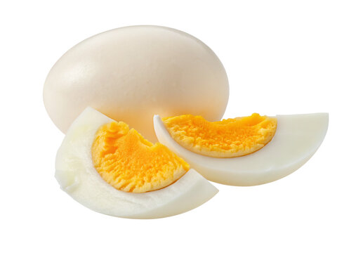 Sliced boiled egg with vibrant yellow yolk isolated on a stark white background for culinary focus