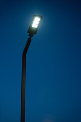 Modern street LED light in the evening