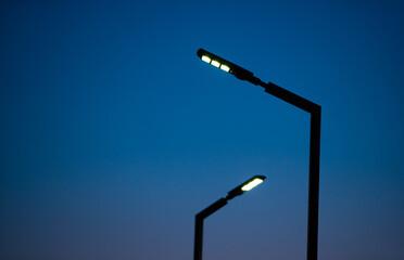 Modern street LED light in the evening
