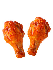 Two spicy buffalo chicken wings coated in red sauce on image