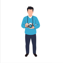 Fototapeta premium A young man holding a camera ready to take photos for professional photography and creative projects.