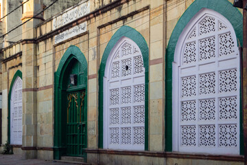 Decorative stone carved Windows & Arches of Imam Bada, Indore, (M.P.). Old sacred place of Shia Muslims build in 1908. Indian Architecture. Selective Focus.