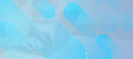 Abstract blue tech background with person working on laptop