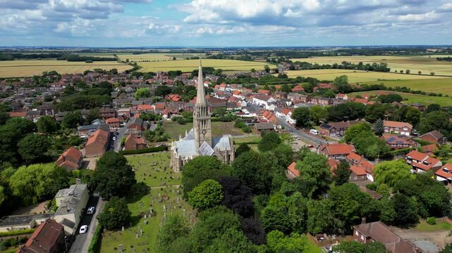 Patrington is a large village and civil parish in the East Riding of Yorkshire, England, in an area known as Holderness, 9 miles (14 km) south-east of Hedon,