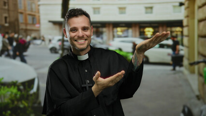 Young man in priest attire on urban street gestures expressively while smiling and surrounded by...