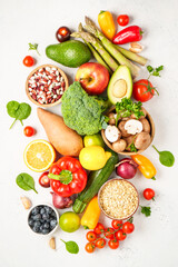 Healthy food assortment on white background.