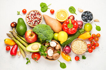 Healthy food assortment on white background.