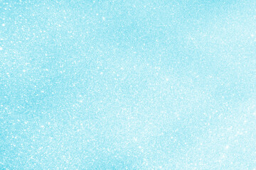 Blue pastel glitter snowfall snowflake texture background. The concept of New Year, Christmas and all celebration background concepts.