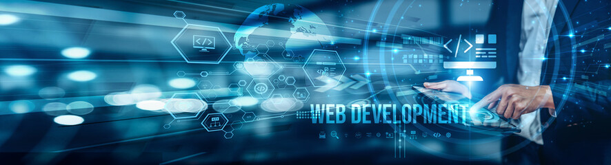 A businessman uses a tablet to analyze web development by reviewing site performance, user data, and design to improve functionality, boost traffic, and enhance overall online business success.