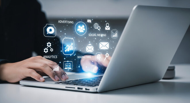 Hands using laptop, digital marketing icons displayed above, showcasing online business strategy, advertising and social media management