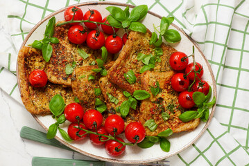 Easy Savory French Toast with Roasted Cherry Tomatoes and Basil..selective focus