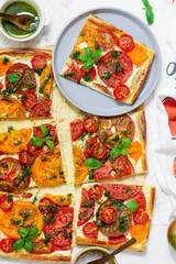 Cheese tomato and pesto  tart.style rustic.