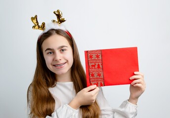 Girl reindeer antlers holding envelope, postcard, greeting, letter Santa different funny emotions
