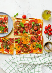 Cheese tomato and pesto  tart.style rustic.