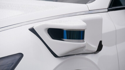 Self-driving vehicle with mounted lidar sensor, close-up shot