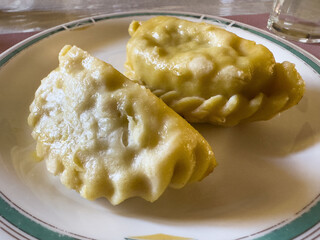 Traditional empanadas on plate: close-up of savory pastries