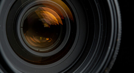 Extreme macro of a camera lens glass and internal rings.