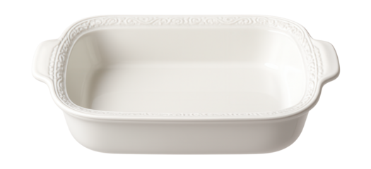 Porcelain baking dish with a decorative rim, suitable for serving directly from oven to table in a residential dining setting.