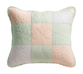 Quilted pillow cover in a pastel patchwork, charming for a vintage-inspired guest room.