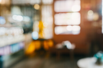 Blurred Background of Cozy Café Interior with Warm Lighting and Inviting Ambiance for Relaxation and Social Gatherings