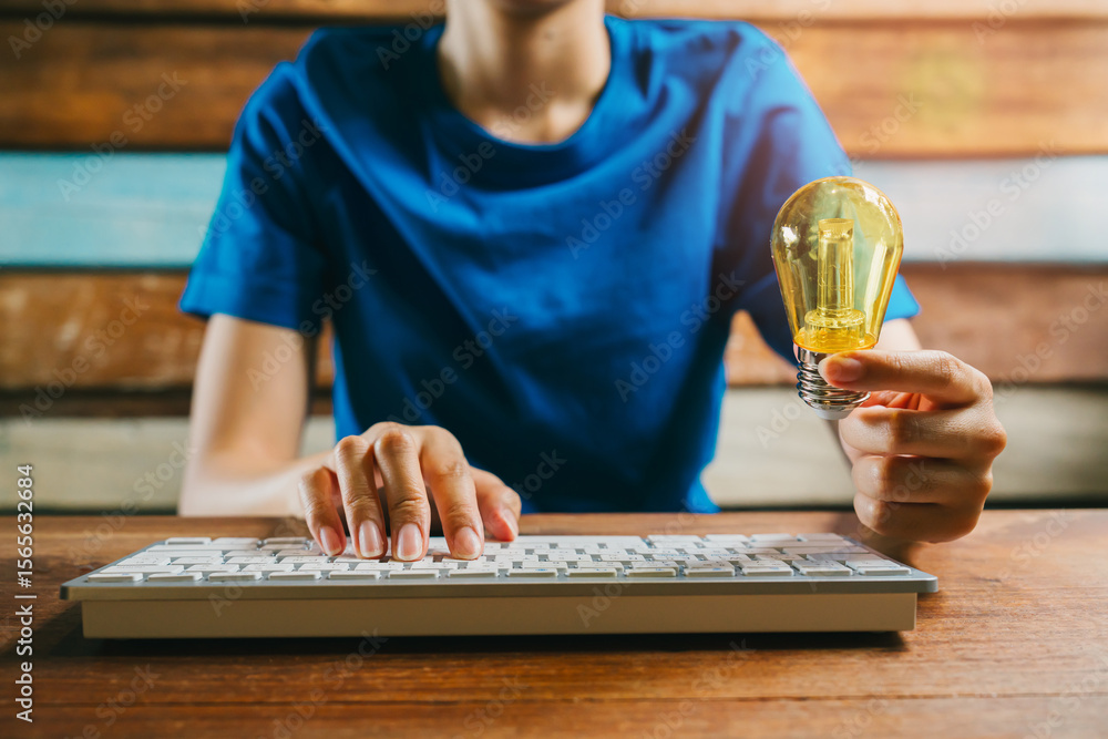 Aufkleber idea concept. creative thinking with light bulb and keyboard symbolizing innovation and ideas in a m