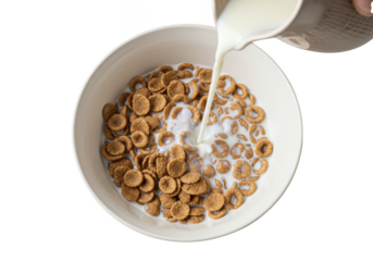 Pouring liquid into a bowl of cereal with a hand visible holding the container above the bowl on transparent background