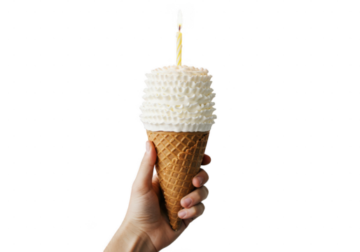 Hand holding a waffle cone with white frosting and a yellow candle against a plain setting on transparent background - Powered by Adobe