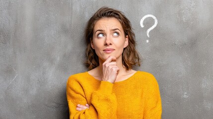 thinking woman with question mark on gray wall background, no logos, no brands