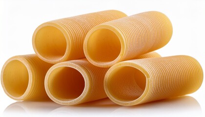 detailed view of raw tortiglioni pasta showing ridged cylindrical tubes with a golden yellow hue ideal for culinary designs or food packaging visuals