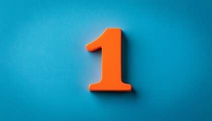 orange colored number one on grayish blue colored background horizontal composition with copy space focused image