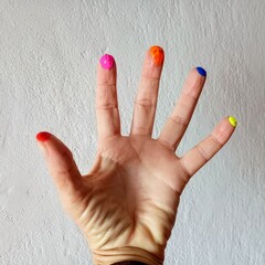 female hand with red nails