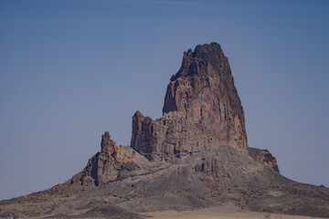  Agathlan / Agathla Peak is an eroded volcanic plug consisting of volcanic breccia / Intrusive...