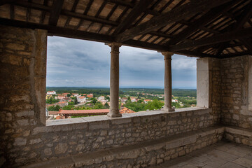 Stone balcony overlooking historic istrian village landscape. Visnjan, Croatia.
