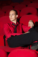 young man sitting on a sofa