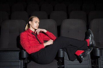 young man in a movie theater