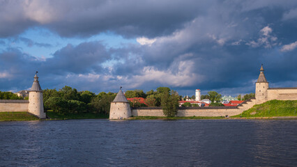 Beautiful evening view of the Pskov Kremlin from Olginskaya embankment. Pskov, Russia.