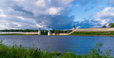 Beautiful evening view of the Pskov Kremlin from Olginskaya embankment. Pskov, Russia.