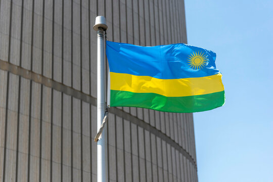 The Rwandan flag on a flagpole at Toronto City Hall’s Nathan Phillips Square. 
