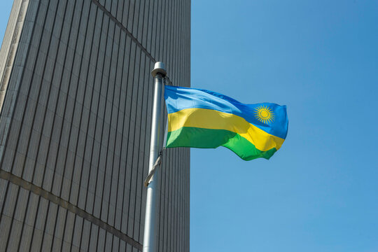 The Rwandan flag on a flagpole at Toronto City Hall’s Nathan Phillips Square. 