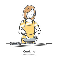 料理をする若い女性