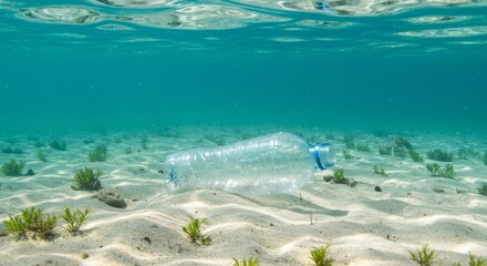 Plastic bottle underwater, environmental pollution, ocean contamination, marine debris, waste, plastic waste, global issue.